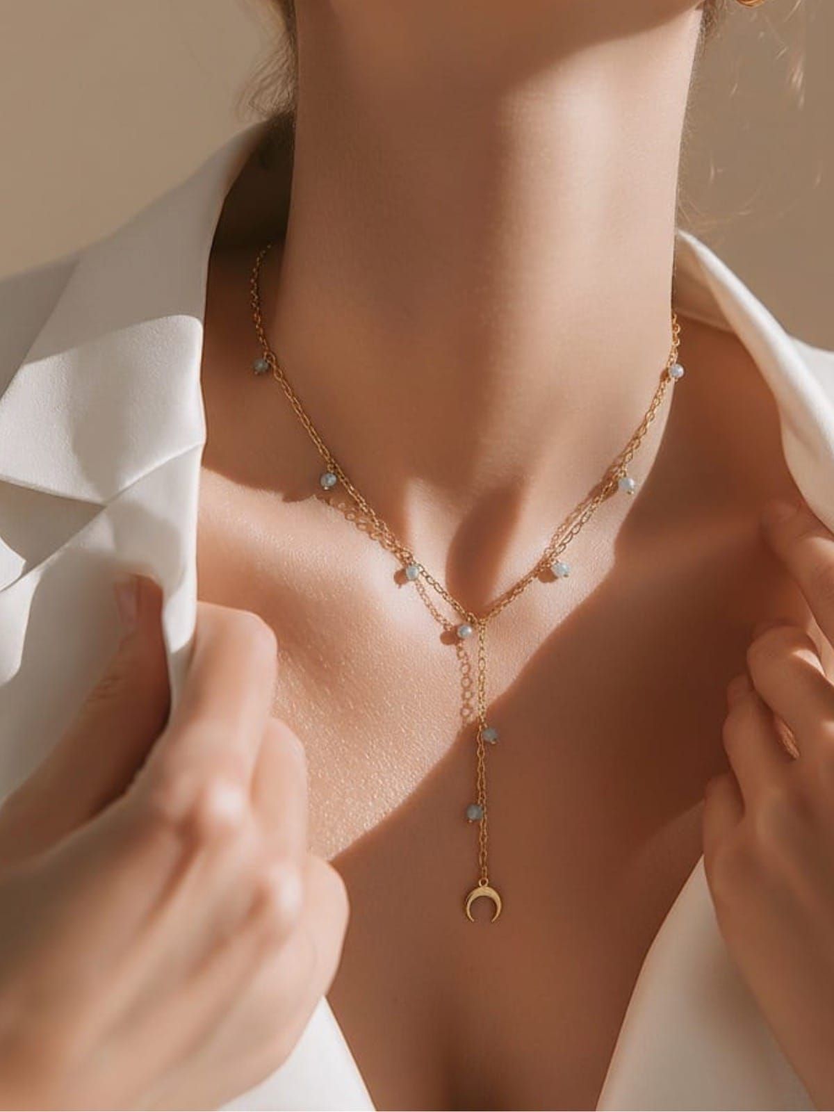 Naszyjnik srebrny pozłacany z akwamarynem i małym księżycem