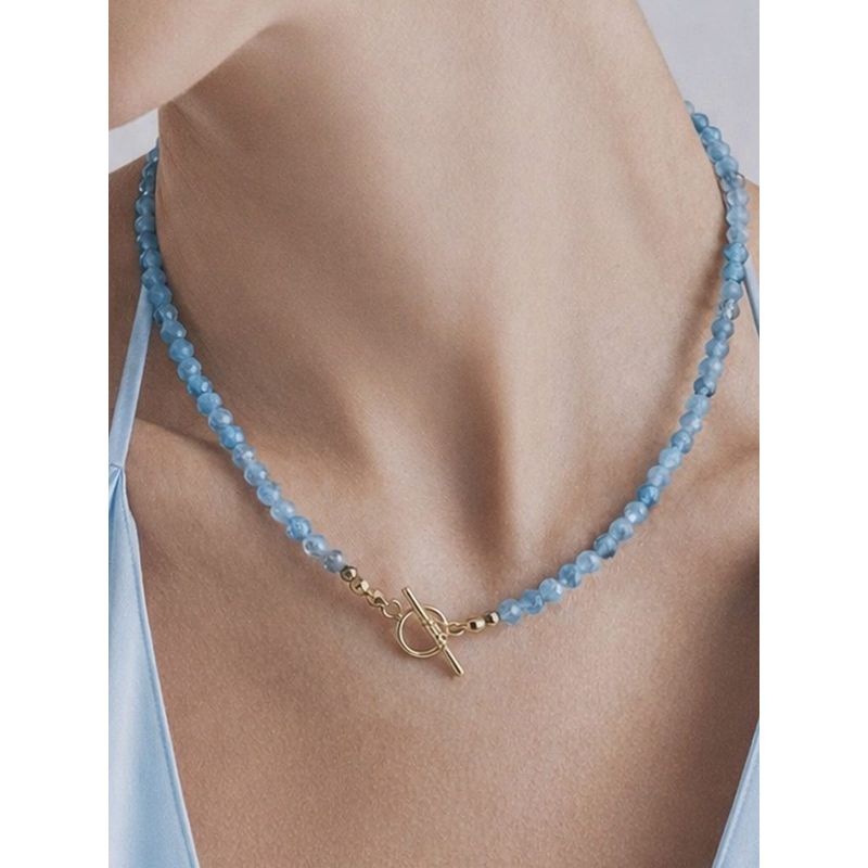 Naszyjnik z akwamarynu z pozłacanym ozdobnym zapięciem